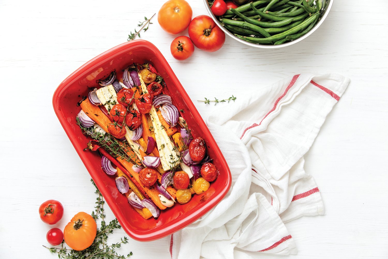 Roasting vegetables is one way to bring incredible flavors into your summer salads.